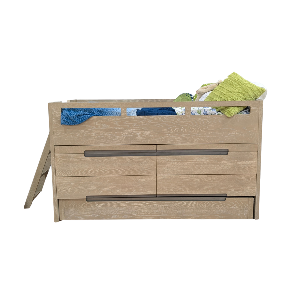 A light oak wood children's storage bed with three drawers and dark metal handles, shown with a ladder on the left and bedding on top, isolated on a white background.